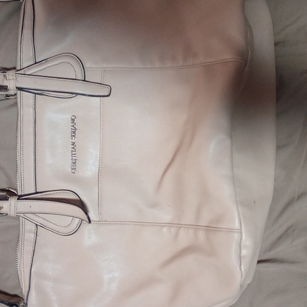 Christian Siriano over shoulder bag